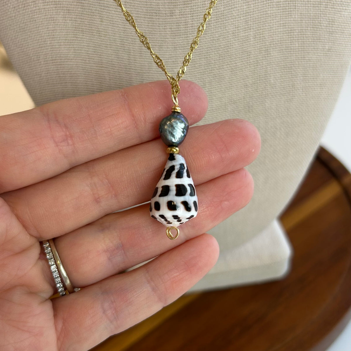 Hebrew Cone Shell Dark Pearl Pendant