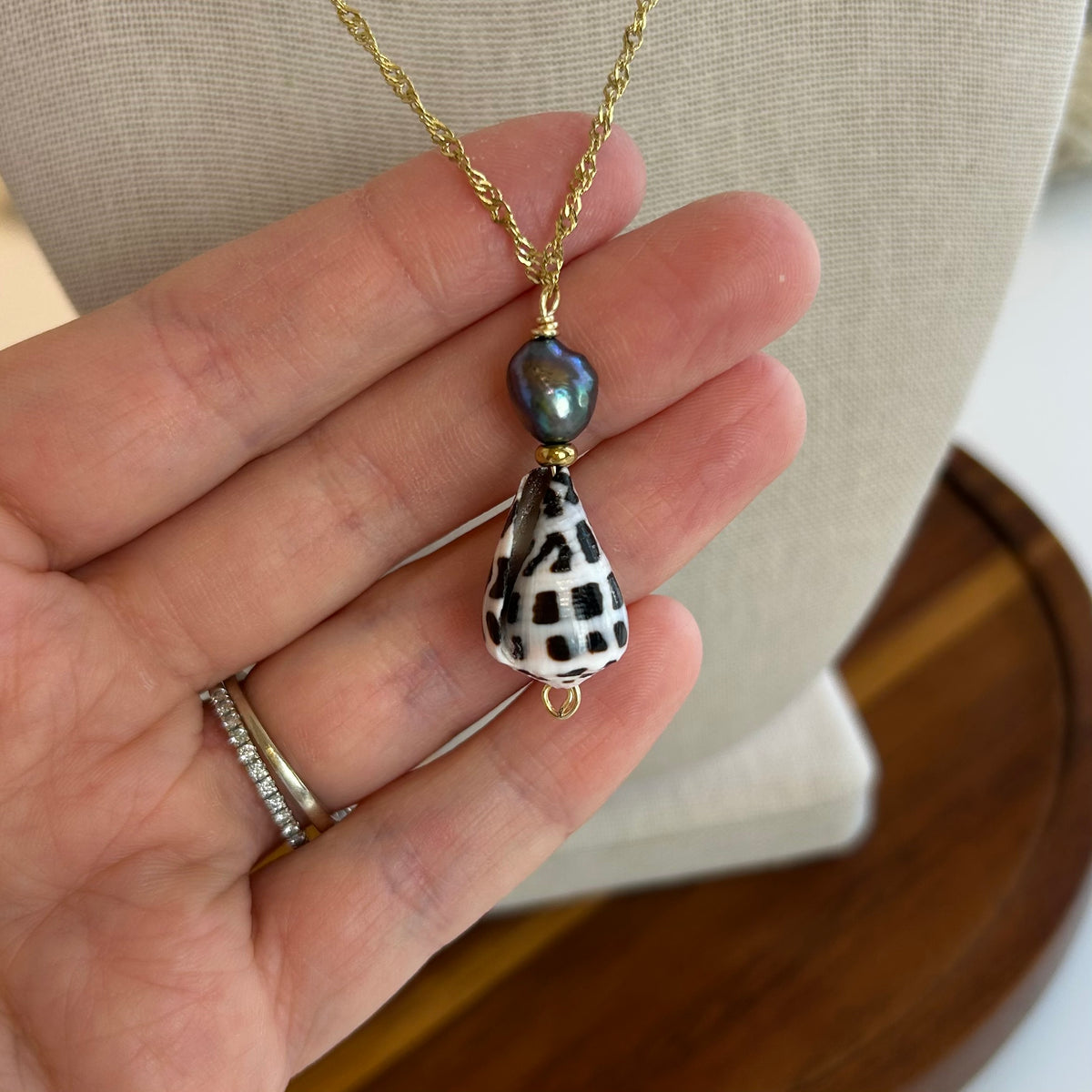 Hebrew Cone Shell Dark Pearl Pendant