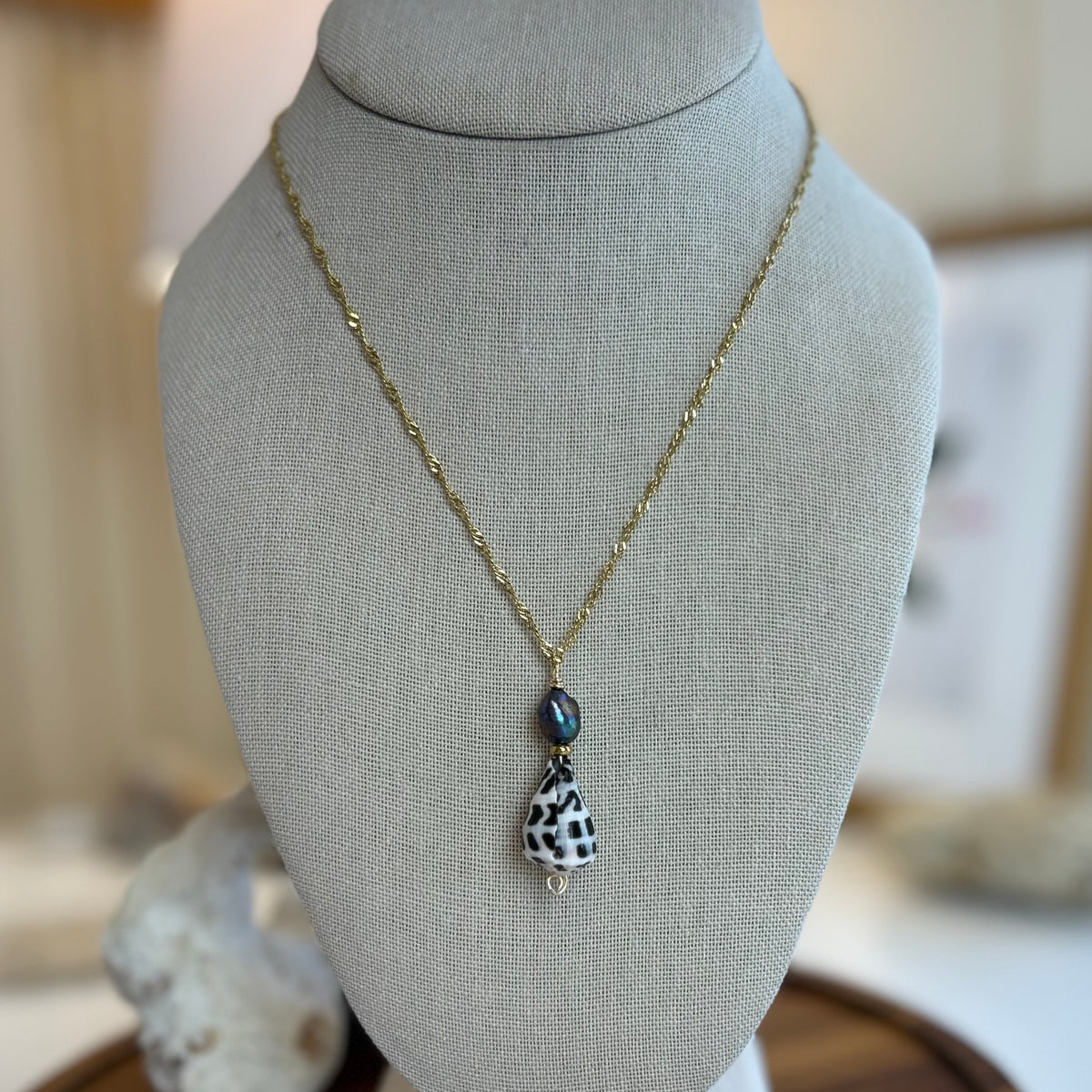 Hebrew Cone Shell Dark Pearl Pendant