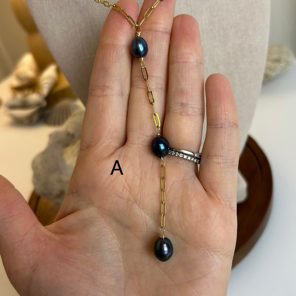 Peacock Pearl Plunge Necklace